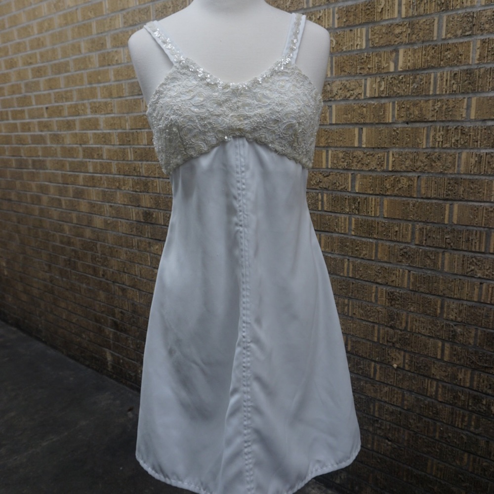 White gown with embellishments